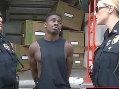 Blonde milf in cop uniform likes to make love hard in all fours with this young black man.